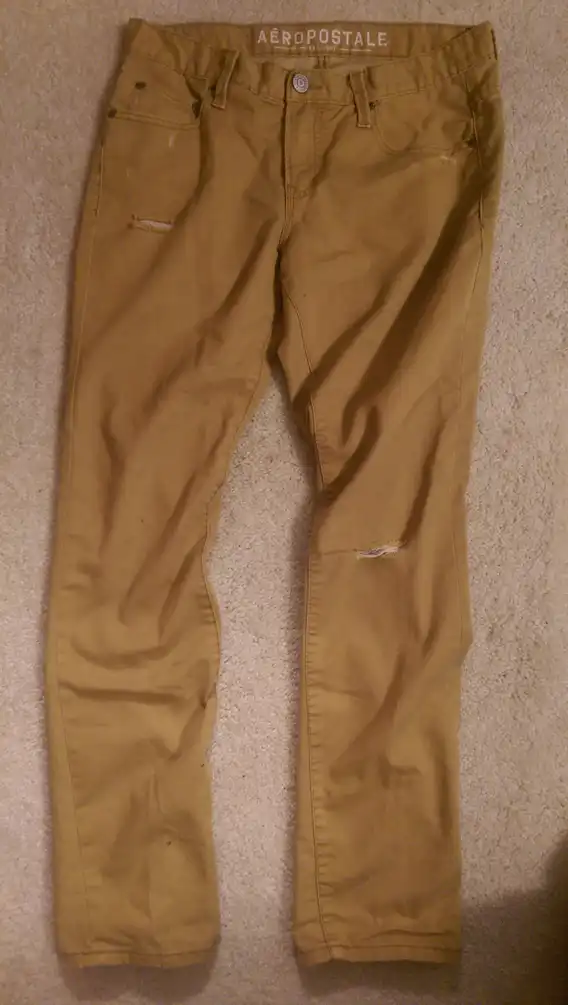 Tan destructed jeans