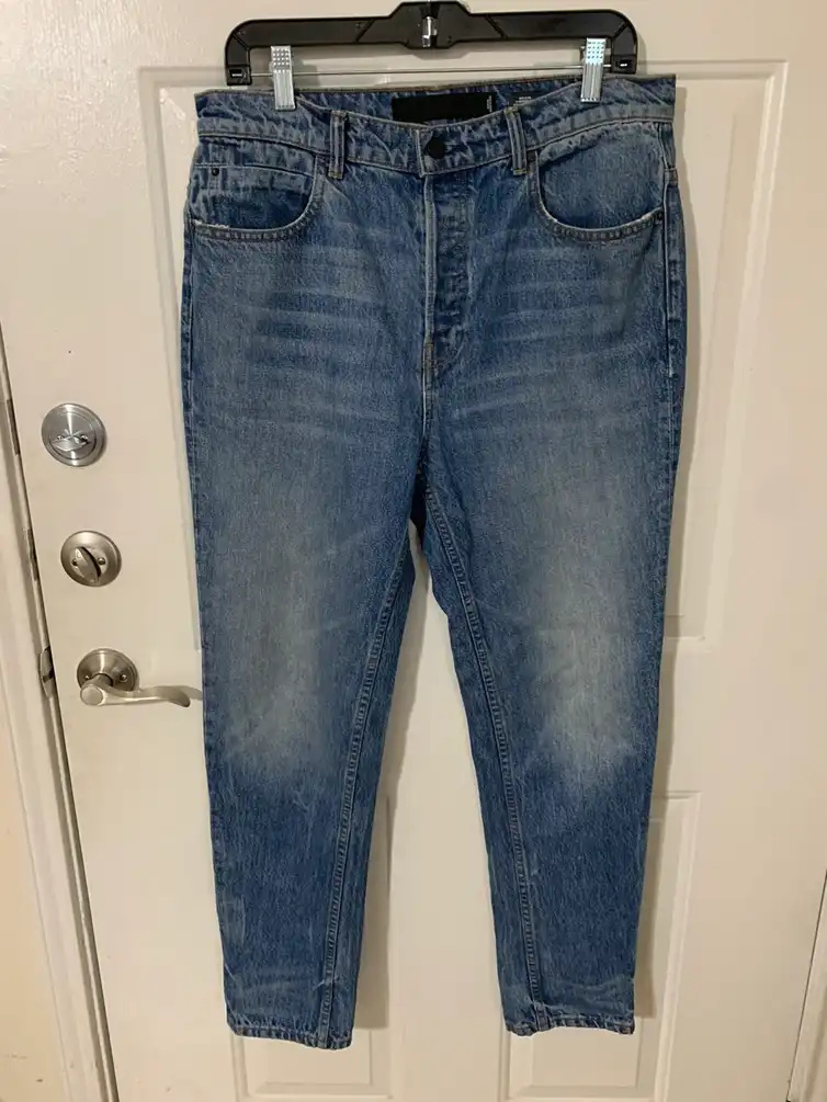 Wang 003 light indigo aged button fly jeans