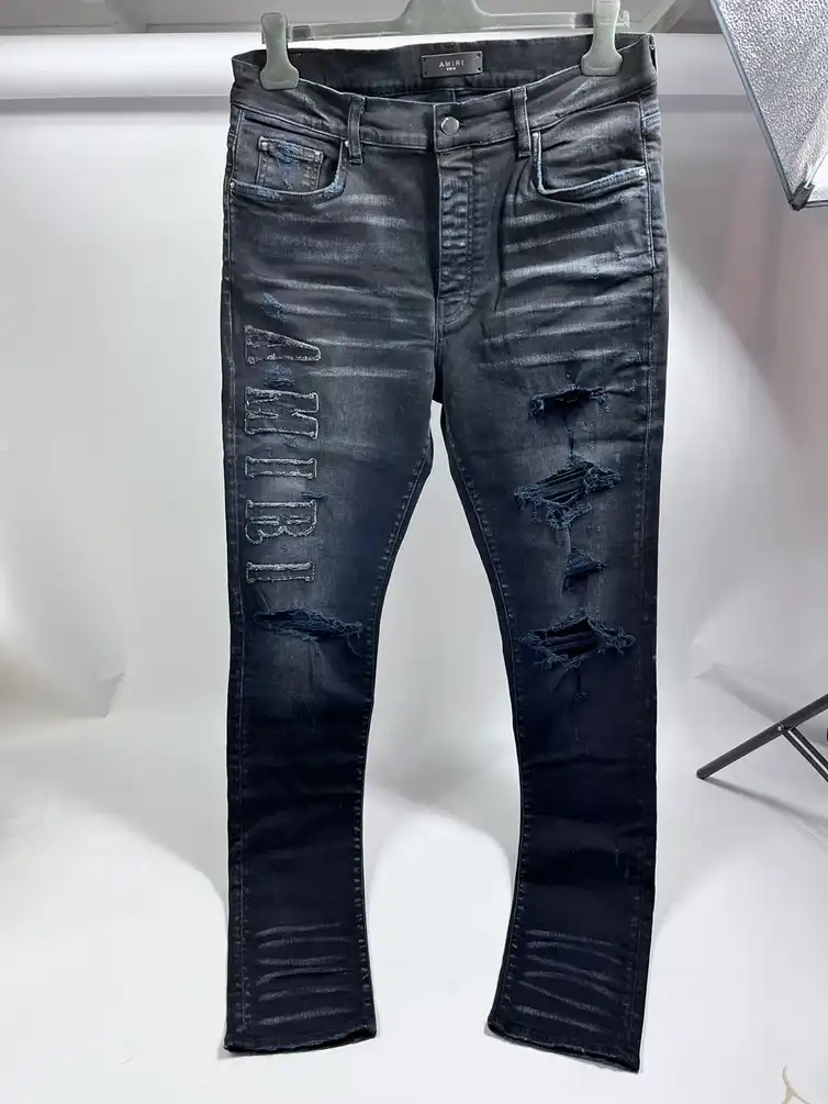 AMIRI LOGO APPLIQUÉ AGED BLACK JEANS