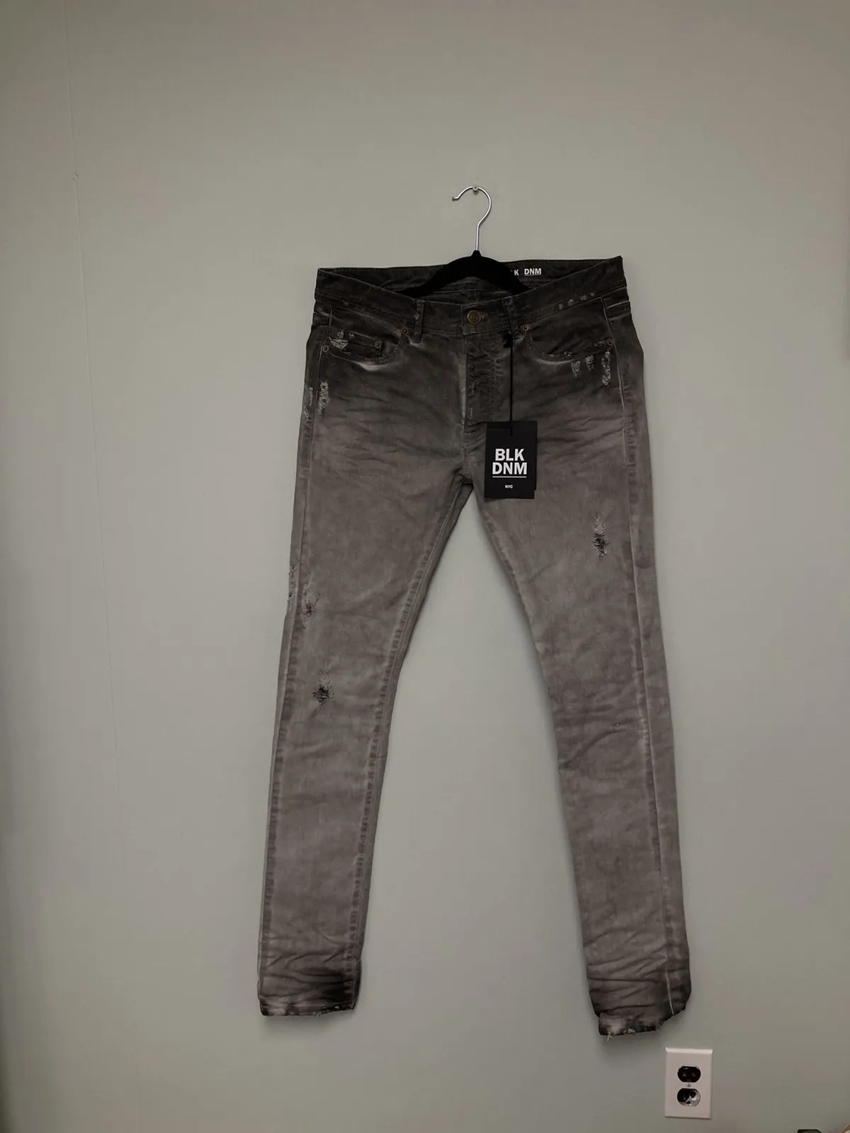 Grey distressed jeans. 31