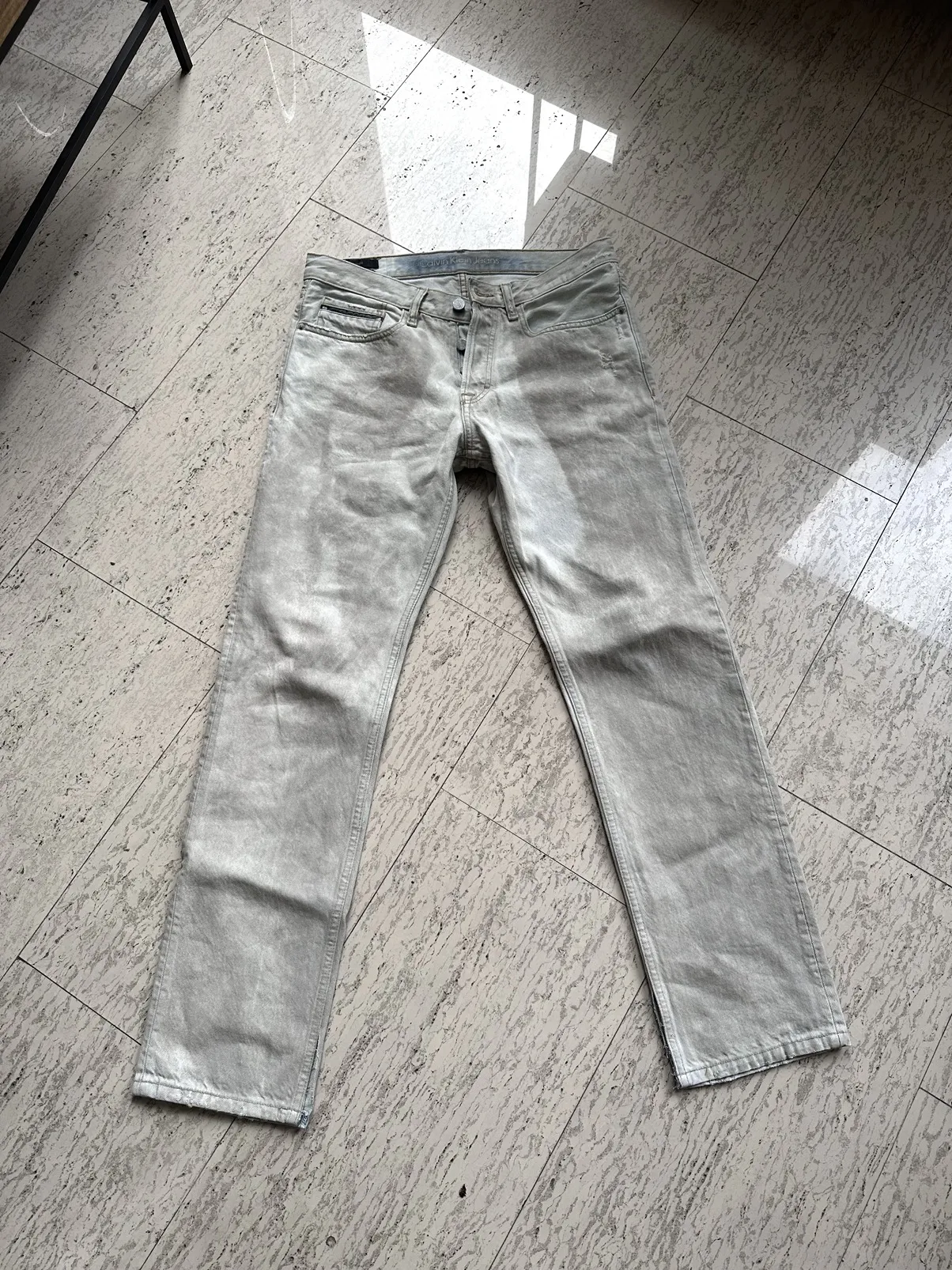 Paint washed Calvin Klein denim