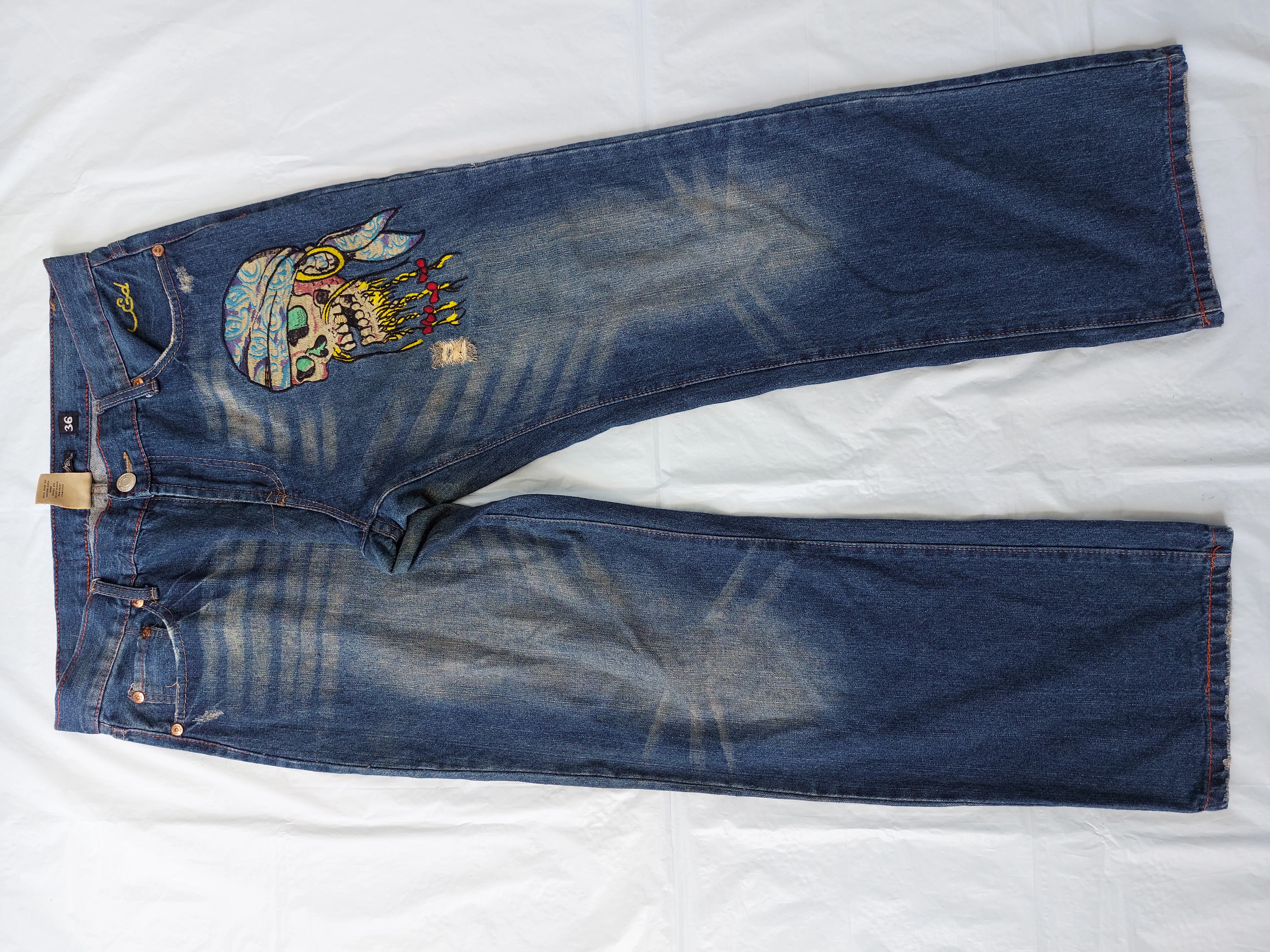 ED HARDY by CHRISTIAN AUDIGIER distressed embroidered denim