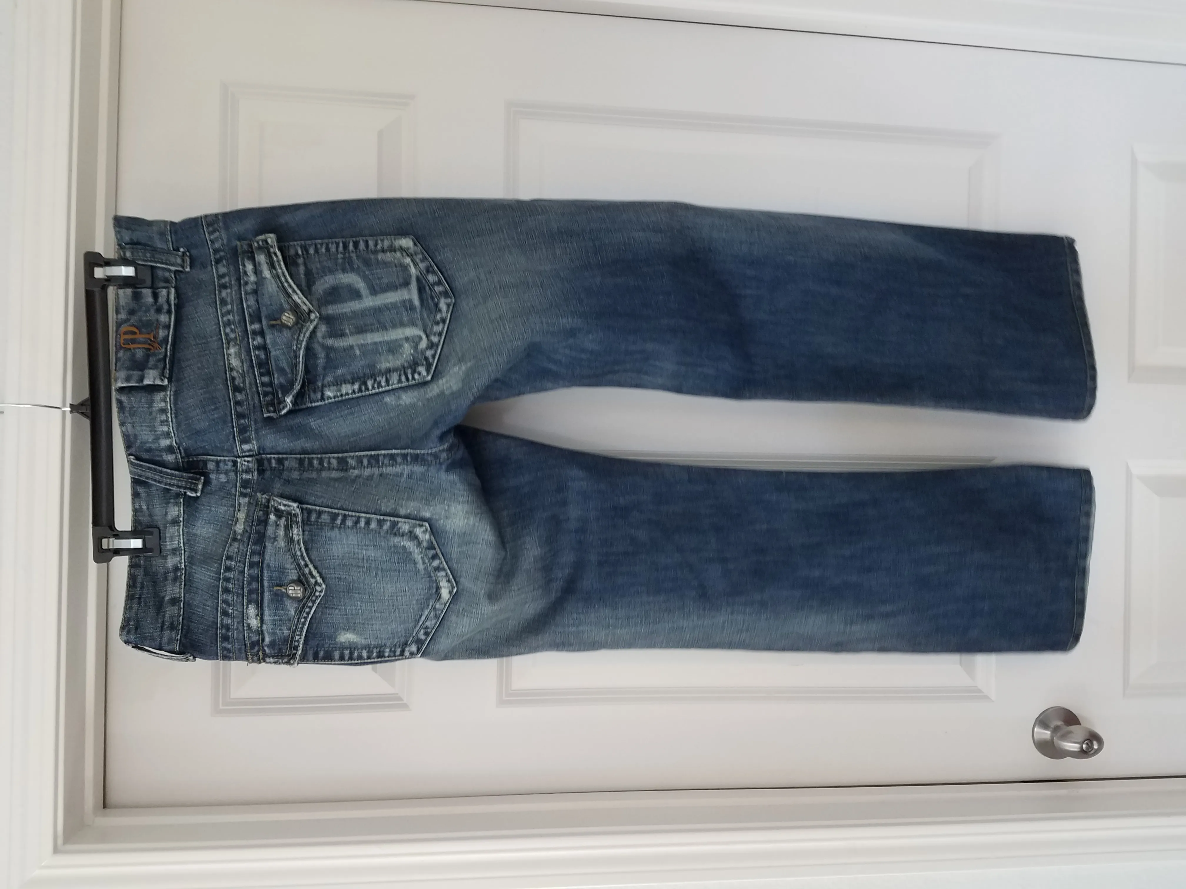 Boot cut, distressed.