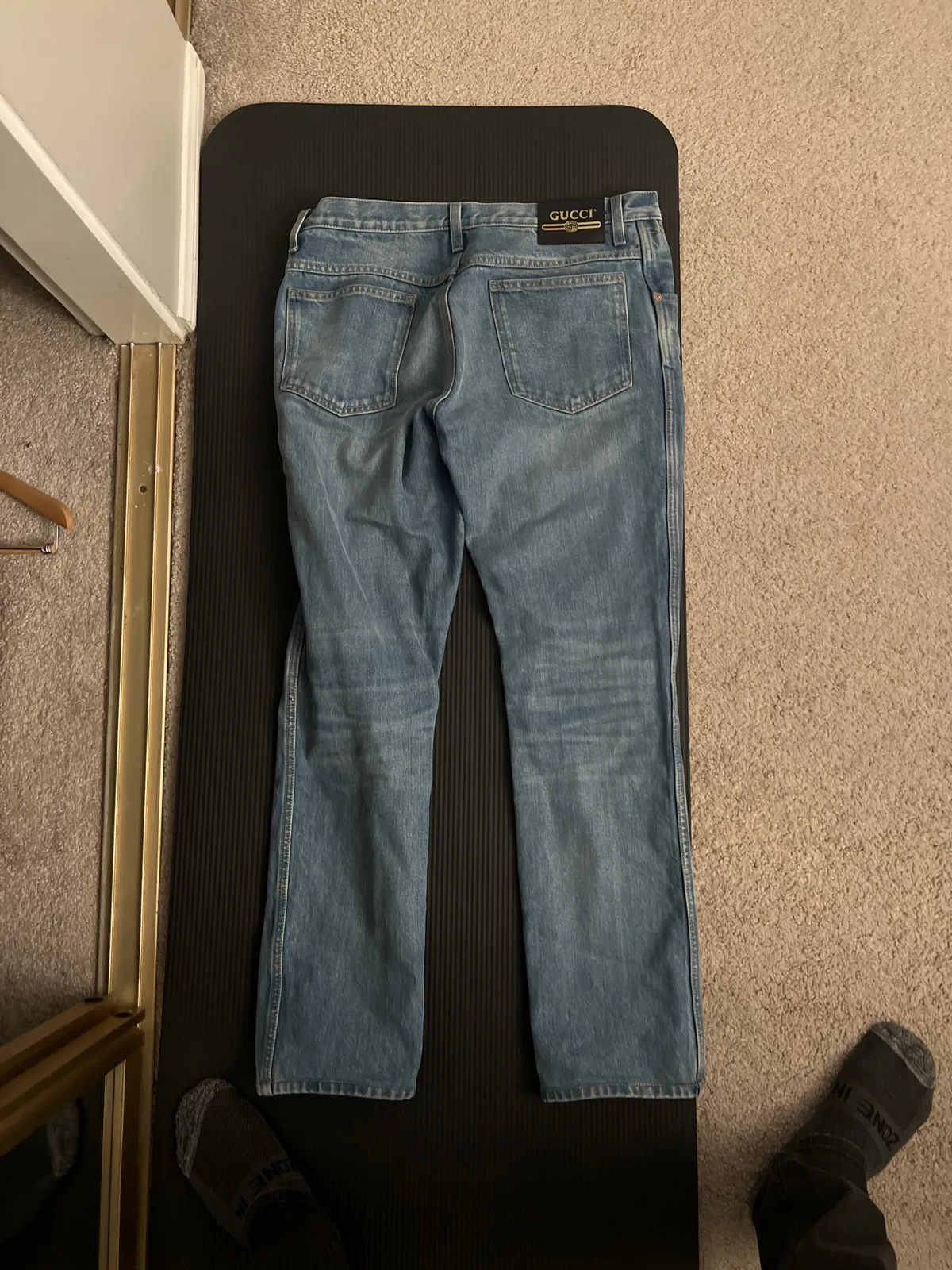 Gucci light wash jeans