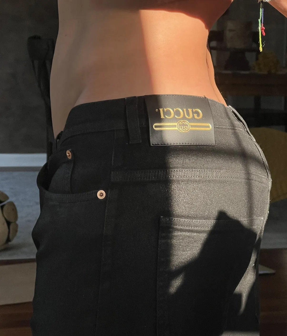 Gucci black waxed denim jeans