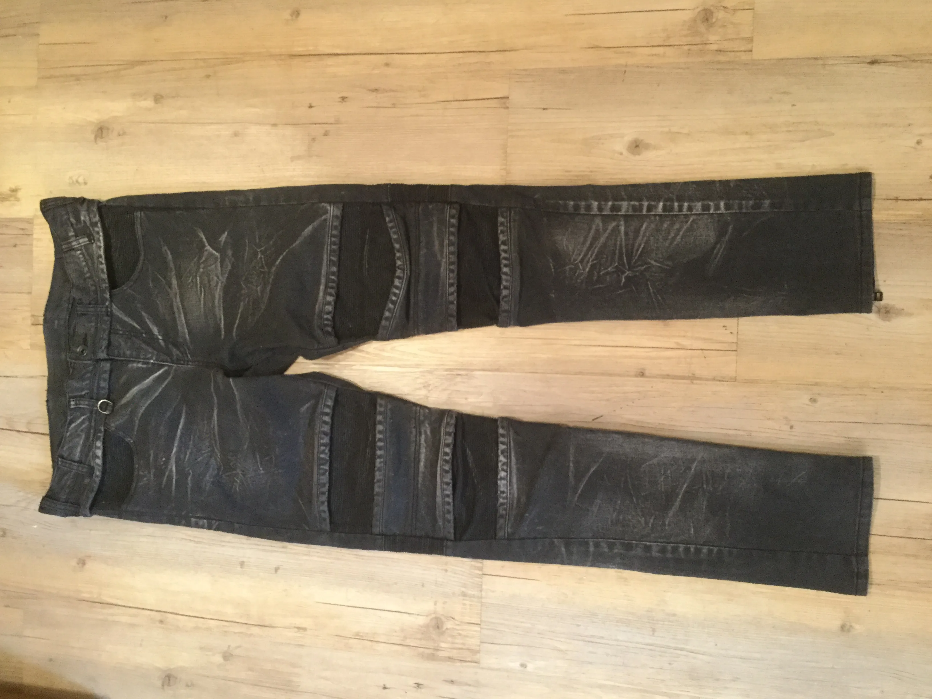 Destroyed biker denim jeans. Runs like Balmain or Dior