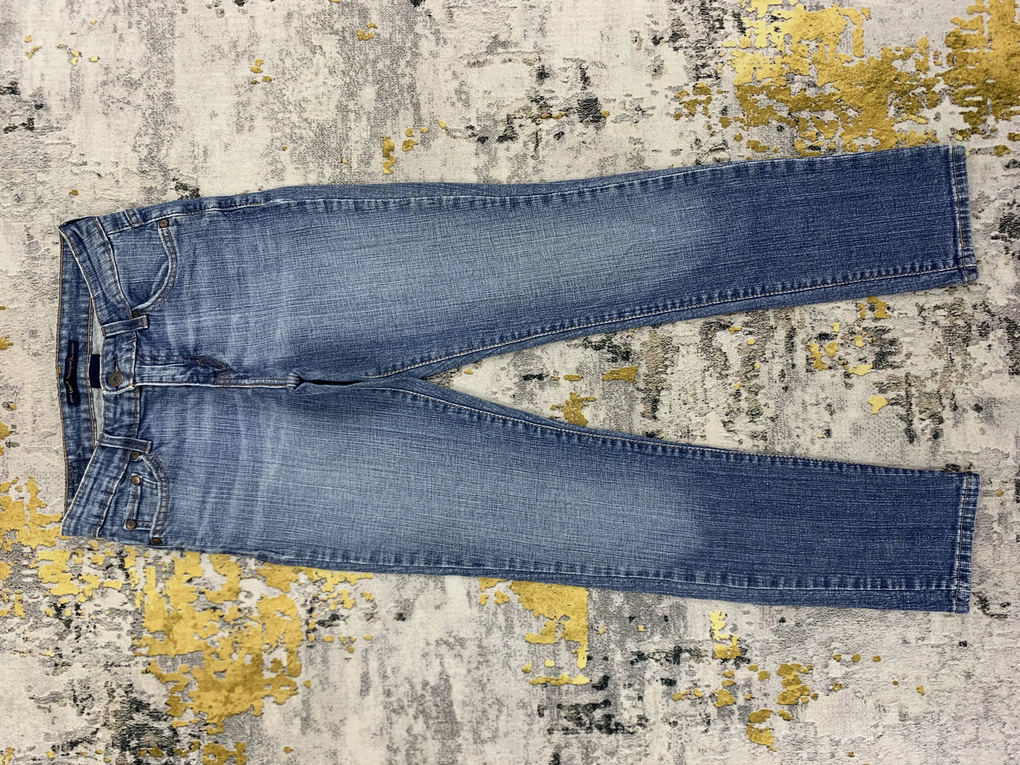Levis Mid Rise Skinny Faded Distress