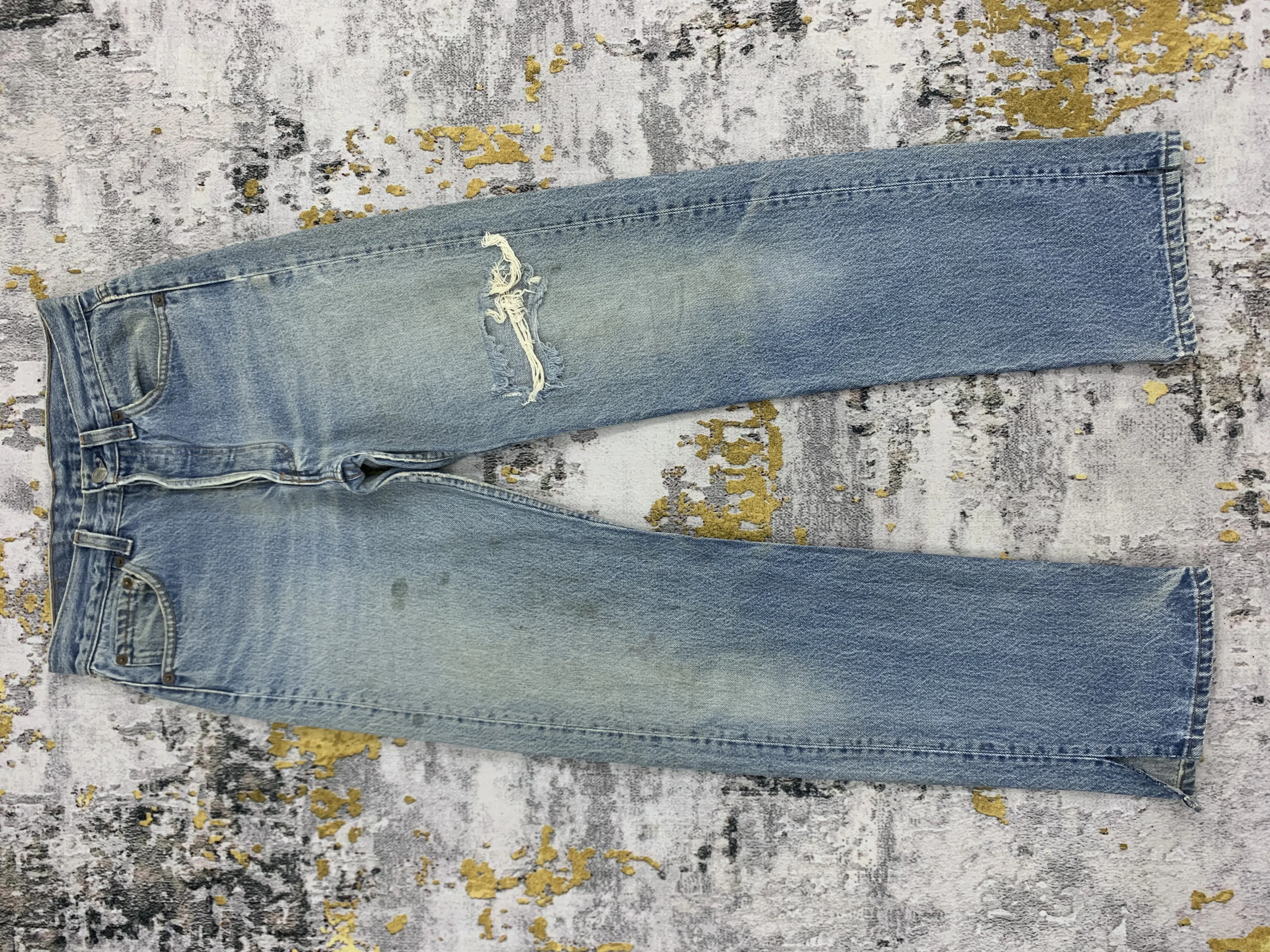 Vintage Levi's 501 Blue Denim Ripped Jeans