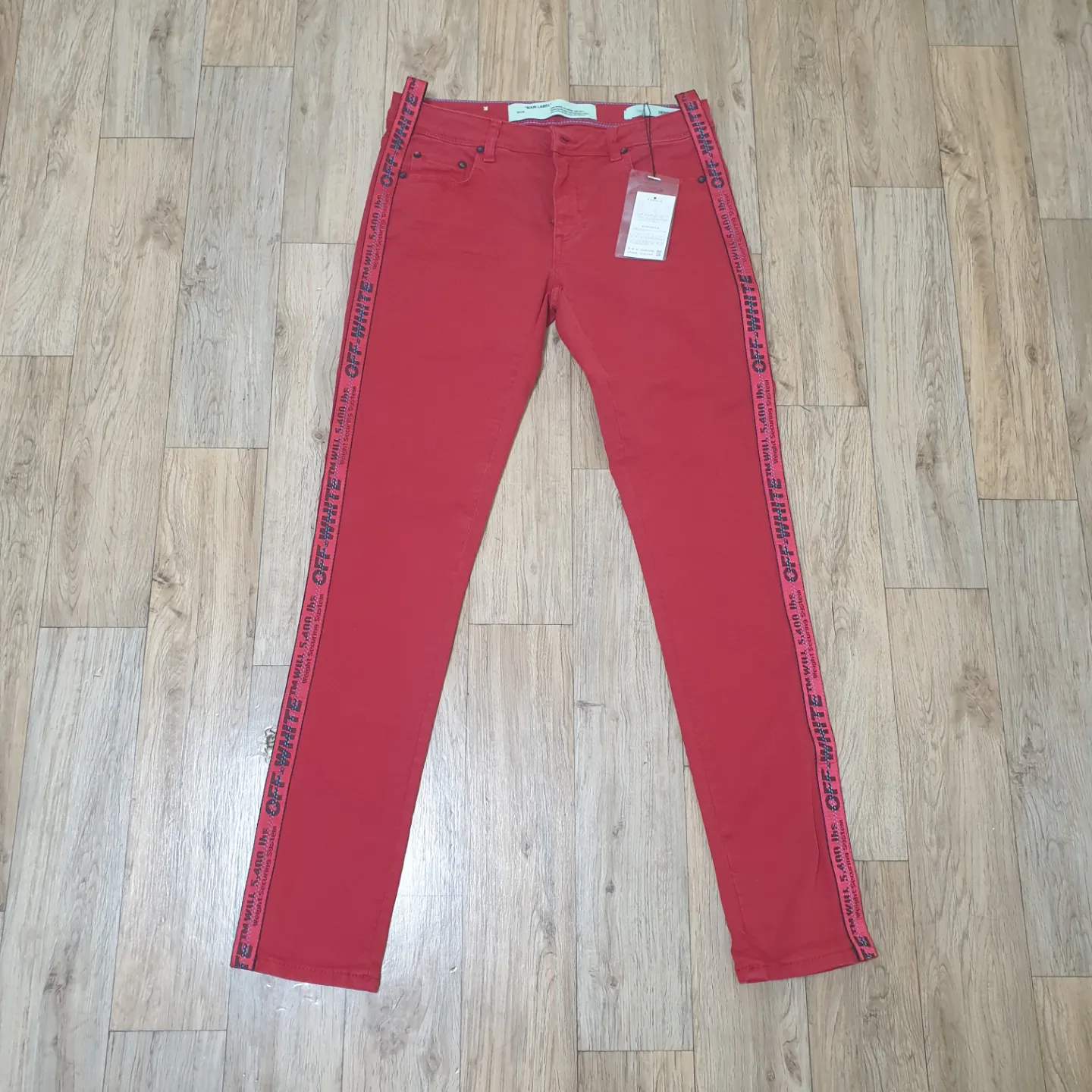 OFF-WHITE red industrial stripe skinny jeans