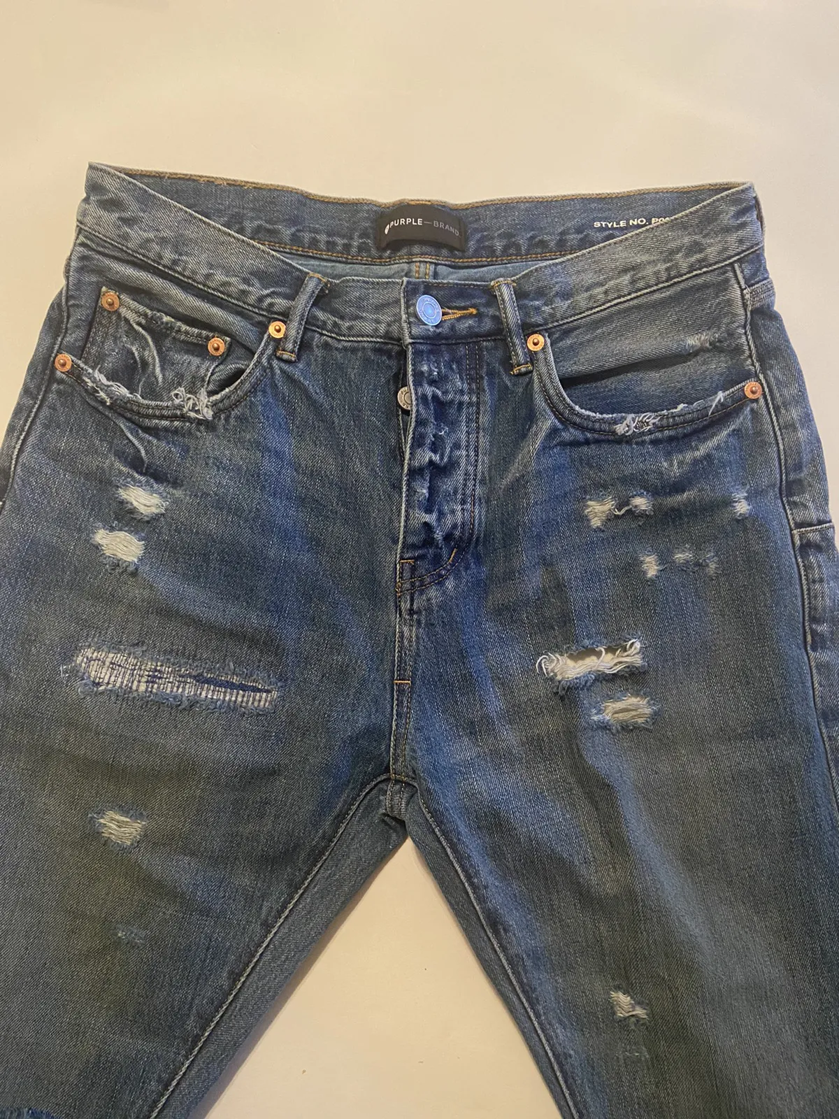 Purple brand distressed denim