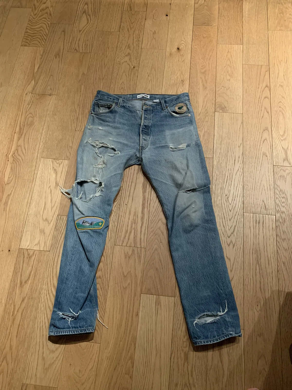Distressed denim with patches