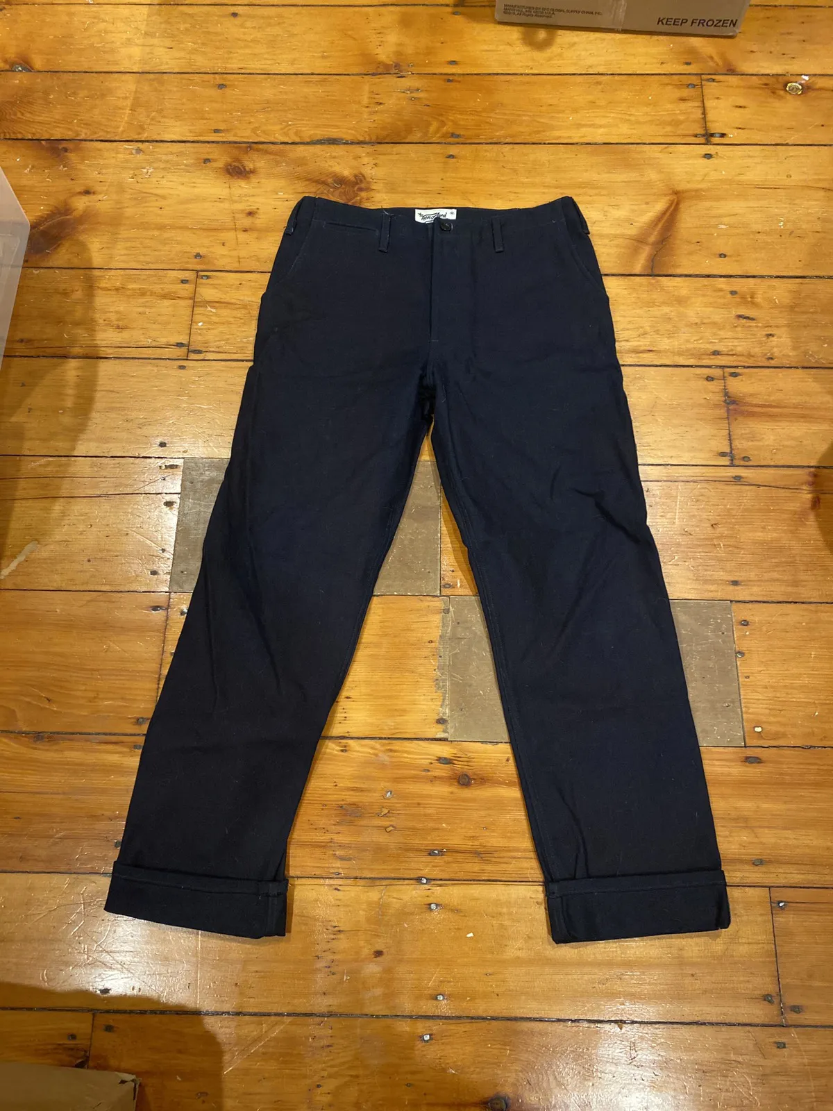 Thee teen aged indigo trousers