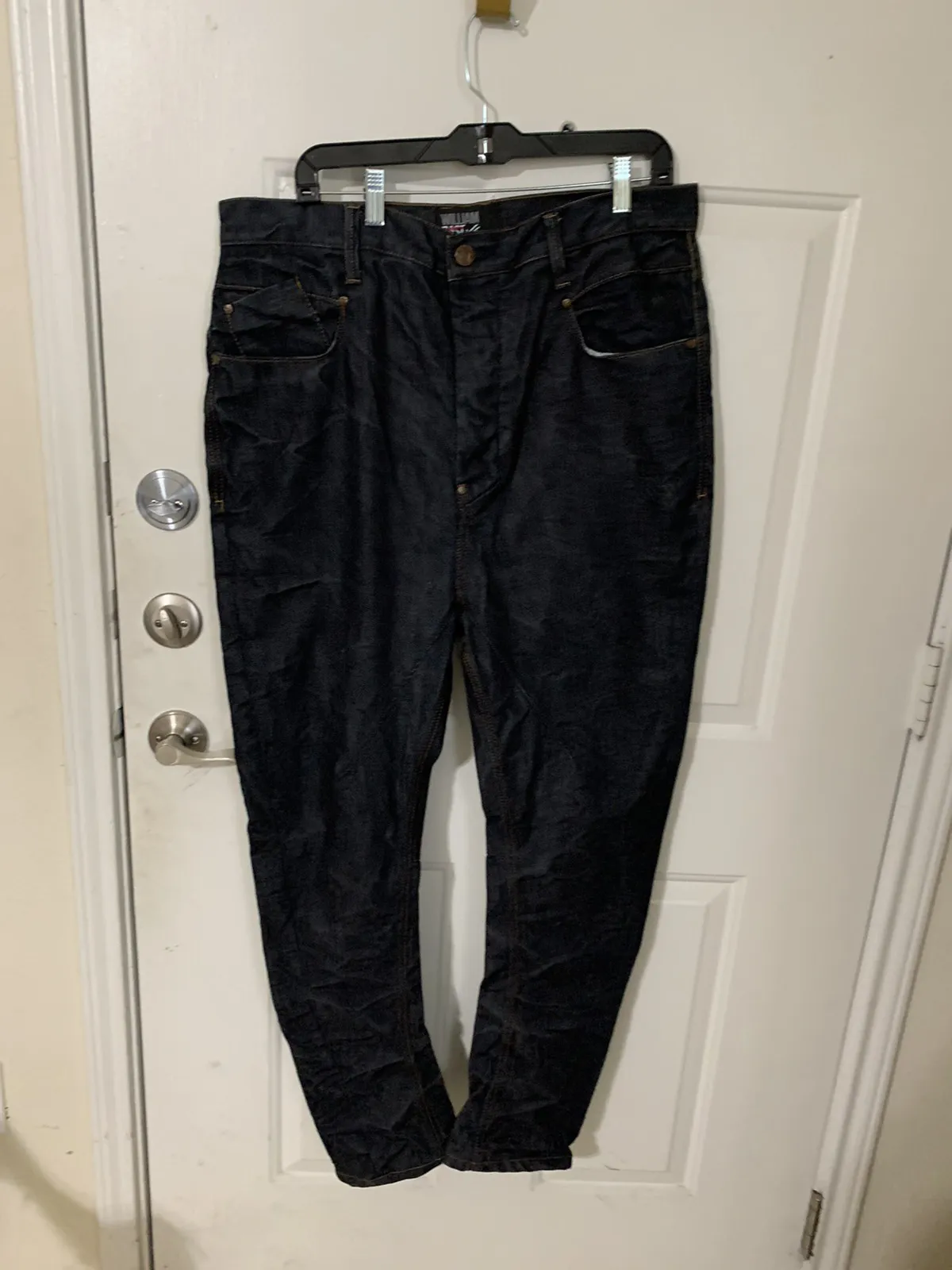 Slouch Crotch Curved Hem Dark denim BTN Fly Jeans