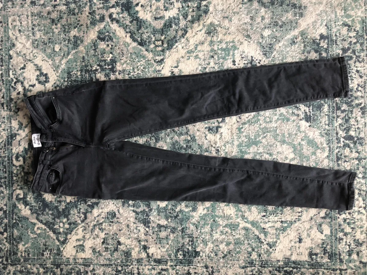 Acne Studios pin used black skinny jeans