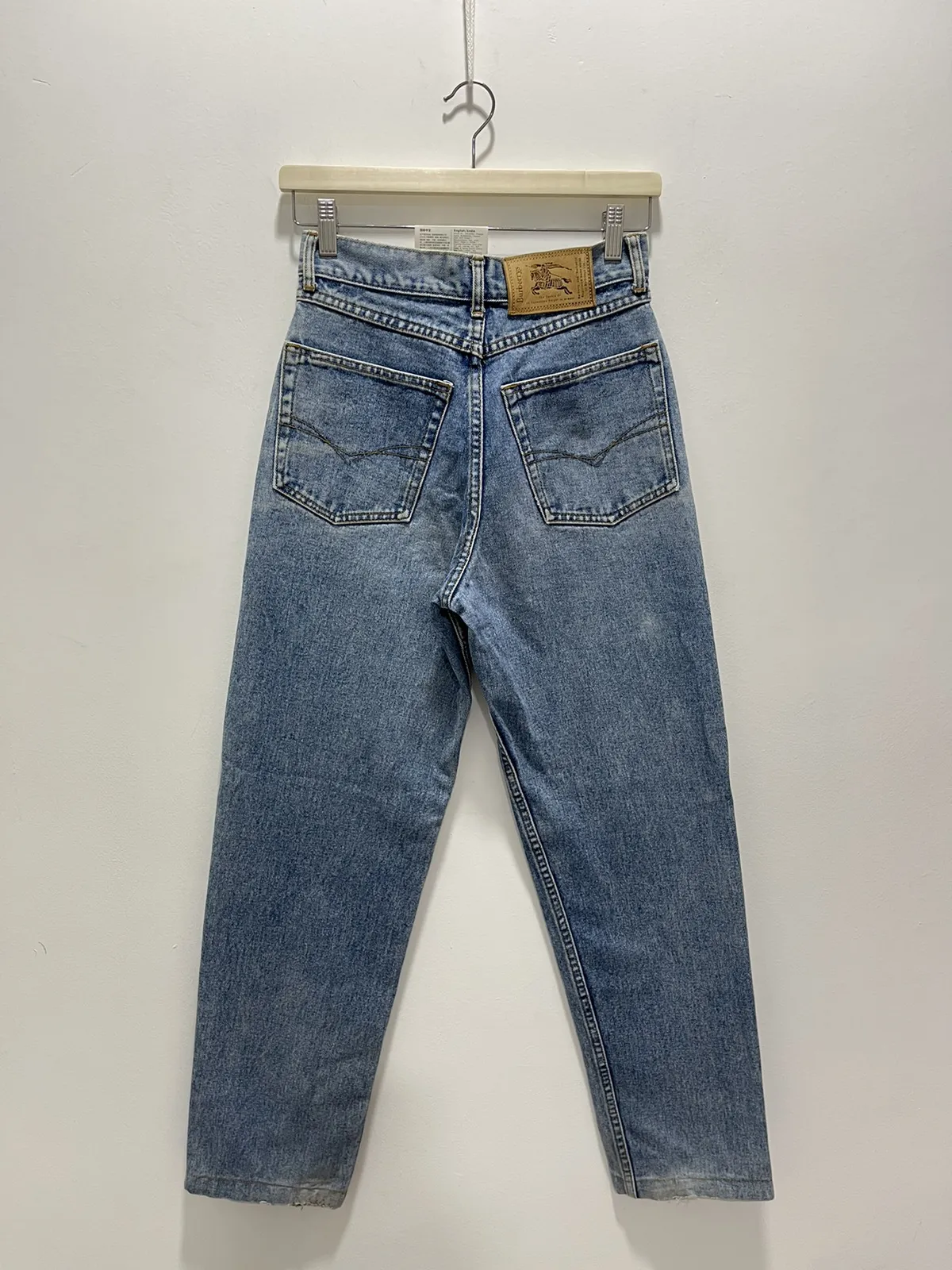 BURBERRY TAPPERED DISTRESSED DENIM JEANS