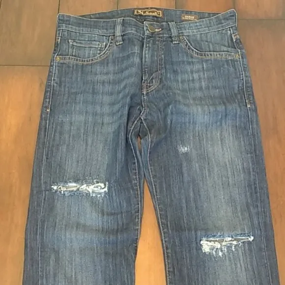 34 Heritage distressed jeans.