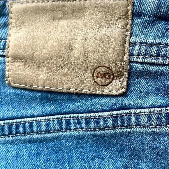 AG Adriano Goldschmed blue jeans the graduate tailored leg 34/34