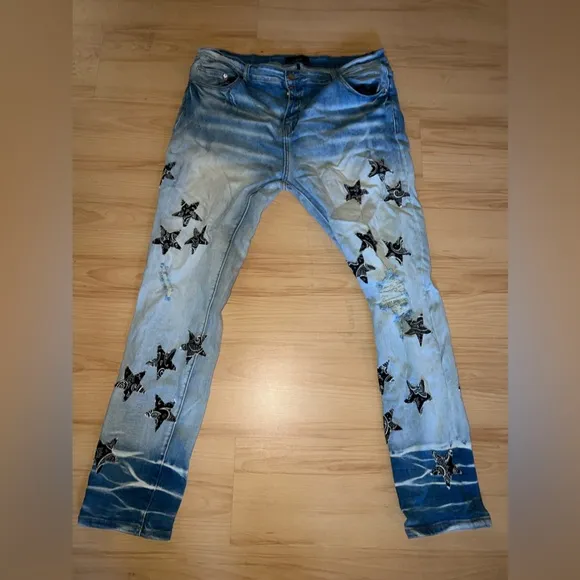 Amiri black star print jeans size 40