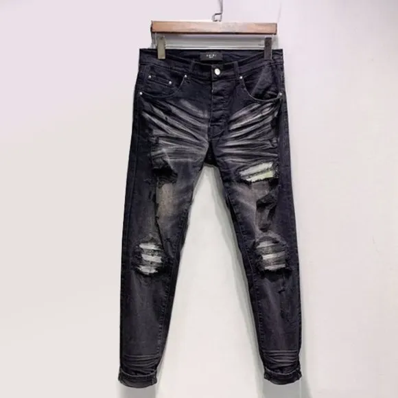 Amiri Blue And White Distressed Denim Jeans