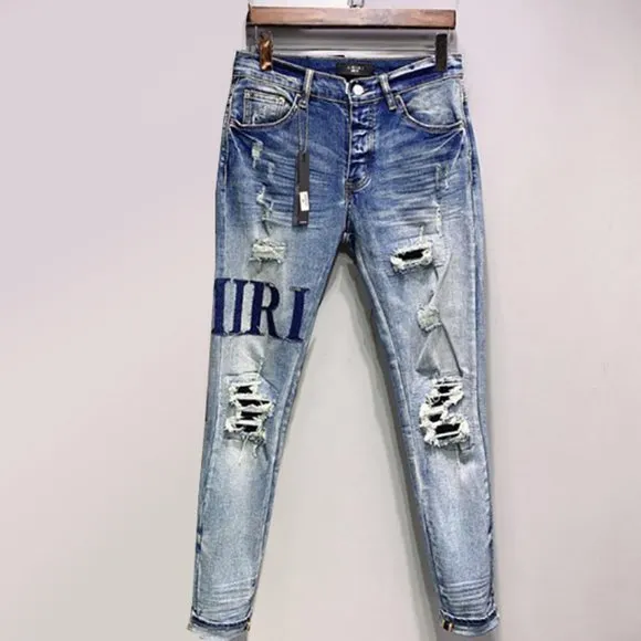 Amiri Blue Stitch Logo Distressed Denim Jeans