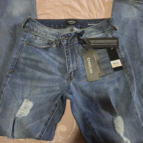 Bebe Blue Distressed Jeans
              
      NWT