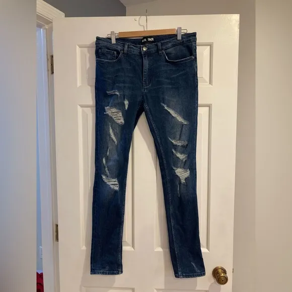 BLK DNM distressed jeans. Size 33 with 32 inseam 
Brand new without tags.