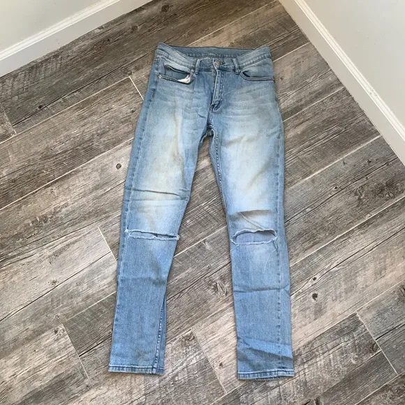 Cheap Monday jeans with cut knees
