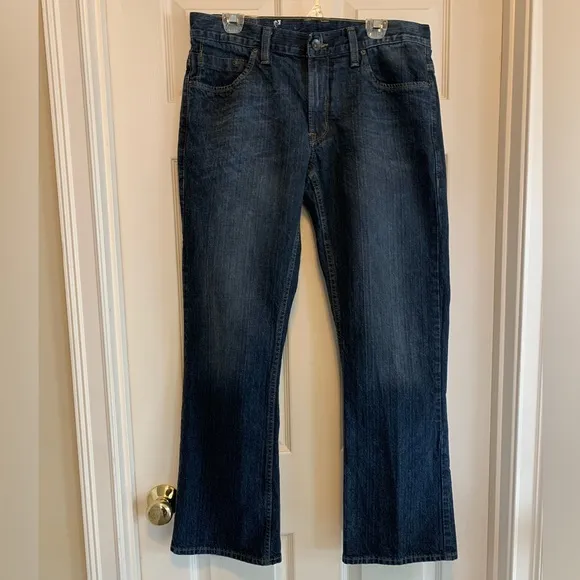 DKNY dark wash Sullivan blue jeans size 34” W x 32” L