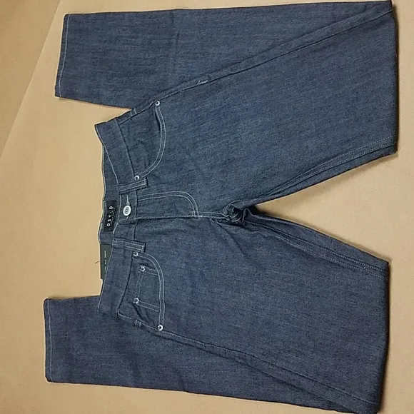 NWT DSTLD Cigarette Raw Jeans
          
      NWT