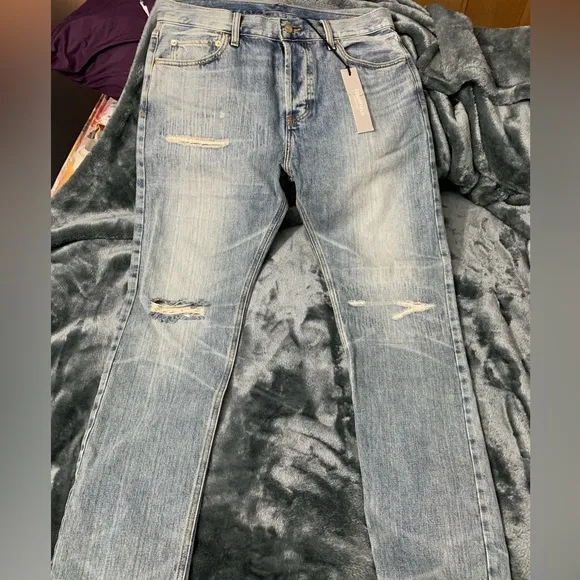 Fear of God Essentials Jeans in Light Indigo sz34
          
      NWT