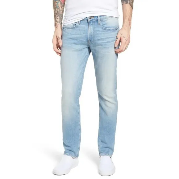 FRAME Denim L'Homme Slim fit distressed mid rise straight tapered jeans Finn 36