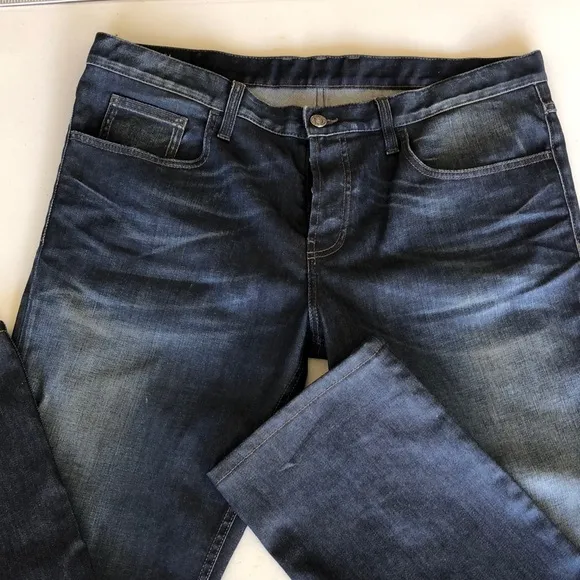 Gucci distressed button fly denim jeans