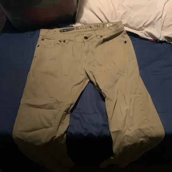 Slim straight tan jeans.