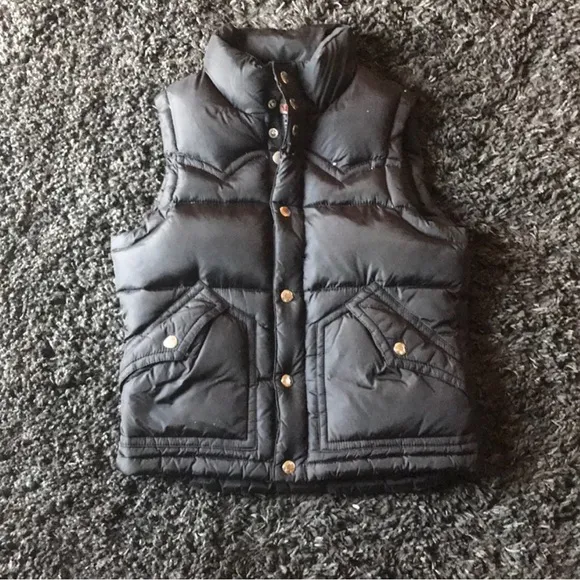 Looking for a vest and a pair of true religion jeans that look like this