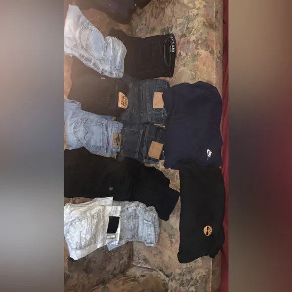 10 pair of kid size jeans , Nike hoodie,  Timberland Hoodie.