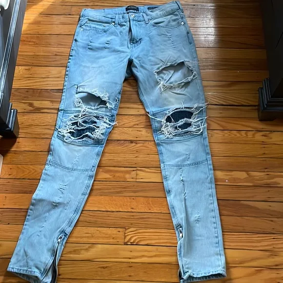 Pacsun jeans with holes and zippers at the bottom