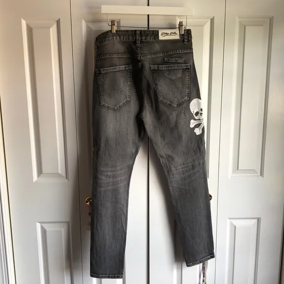 Black distressed skull jean size 33 x length 38 inches Long. I have 2 pairs.