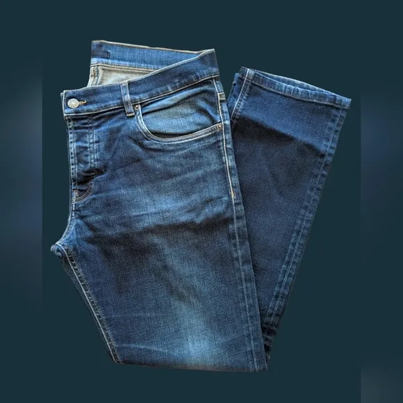 PRADA Tapered-fit stretch-denim trousers