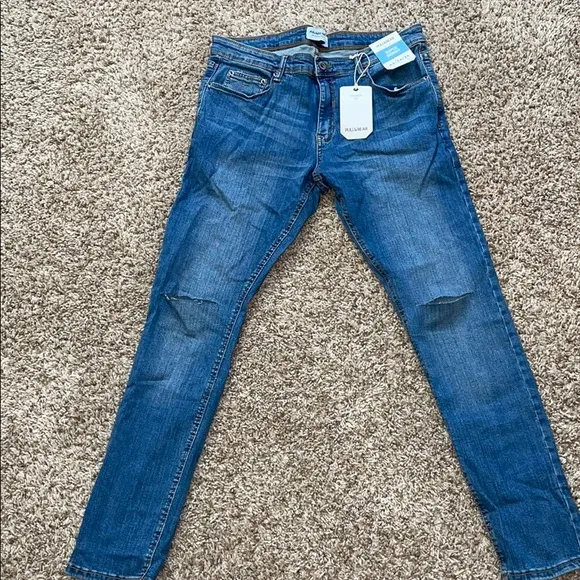 Jeans with Ripped Knees
          
      NWT