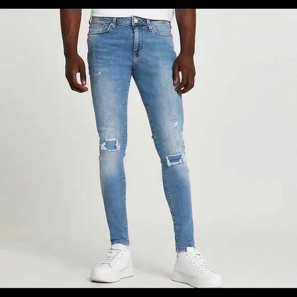 Men’s river island blue ripped skinny jeans
          
      NWT