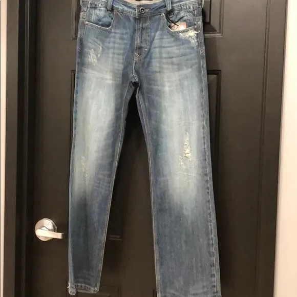 Vigoss Blue Jeans with Gray Pocket Detail
          
      Boutique