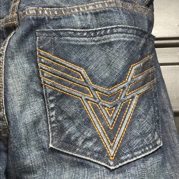 Men’s Vigoss Blue Denim with Gold Stitch Pocket
          
      Boutique