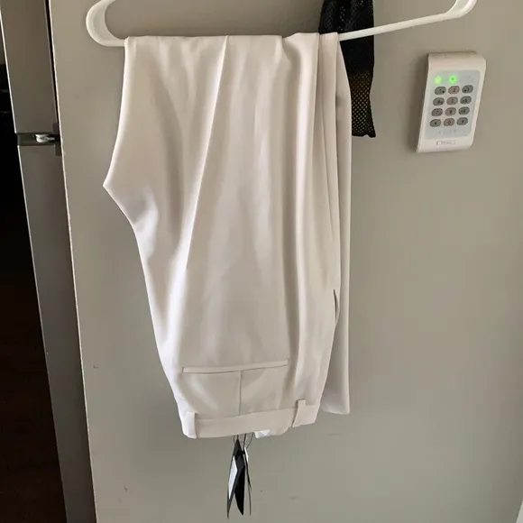 White Saint Laurent pants size 52
          
      NWT