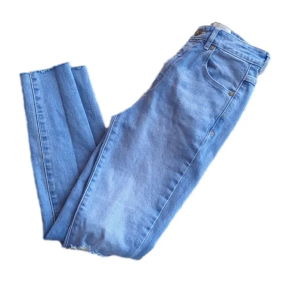 A brand Lighter Wash Distressed High Rise Skinny Blue Jeans Size 24 Waist 24.5