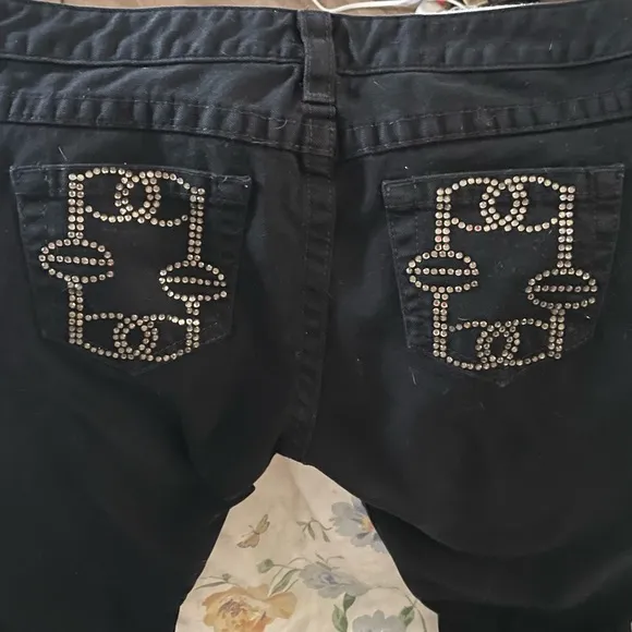 Never worn new without tags black jeans no flaws BEBE GOLDBLING
          
      Boutique