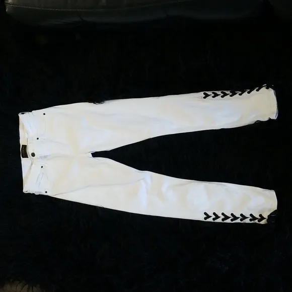 Black Orchid 26 skinny/crop white stretch jeans with black lace up detail