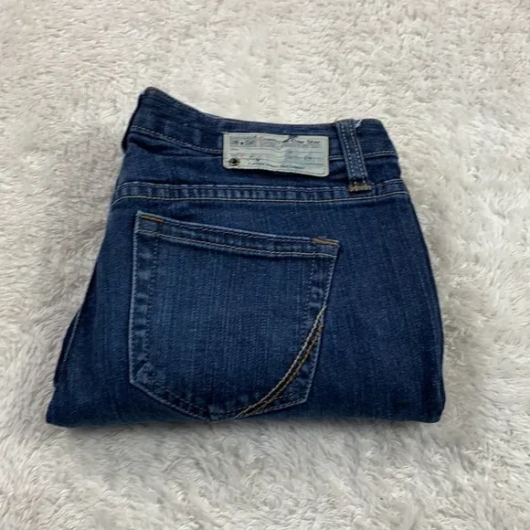 Converse low rise bootcut jeans, size 6