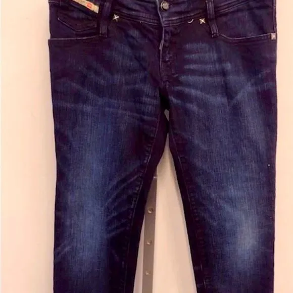 Diesel straight leg skinny jeans . Dark wash with black detail . 30x30 Like new